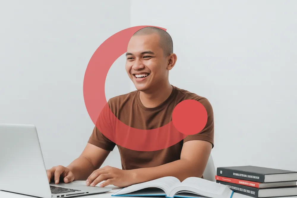 Bimbel Akpol Exademy, peserta membaca buku terbuka di samping laptop