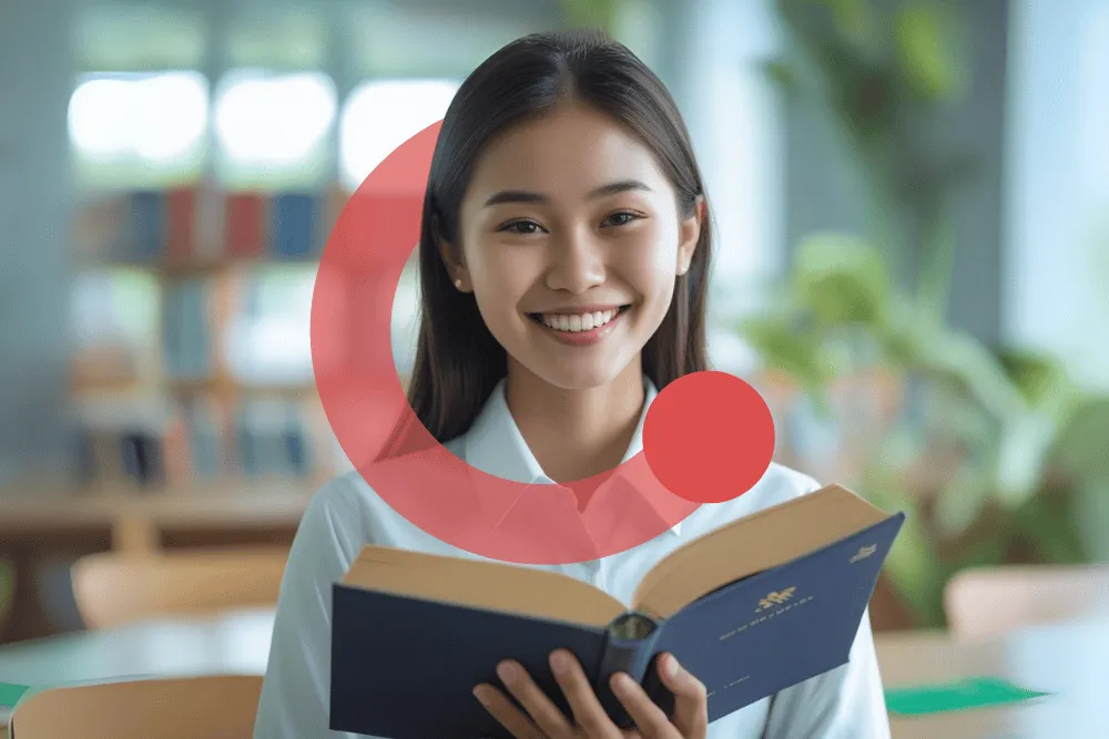 Bimbel PPPK Exademy, peserta memegang buku materi terbuka sambil tersenyum