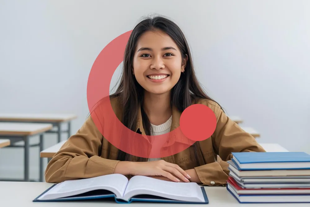 Bimbel PPPK Exademy, peserta belajar dengan buku terbuka dan tumpukan referensi