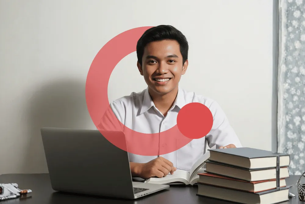 Bimbel SKD sekolah kedinasan Exademy, peserta belajar dengan laptop dan tumpukan buku